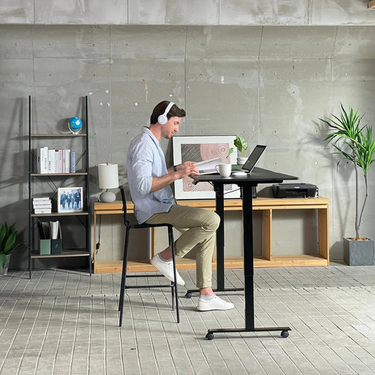 Beyond the Wires: Why IT & Facilities Should Champion the Standing Desk - Vvenace